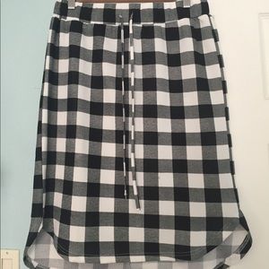 Tickled Teal curved hi-low hem drawstring skirt.